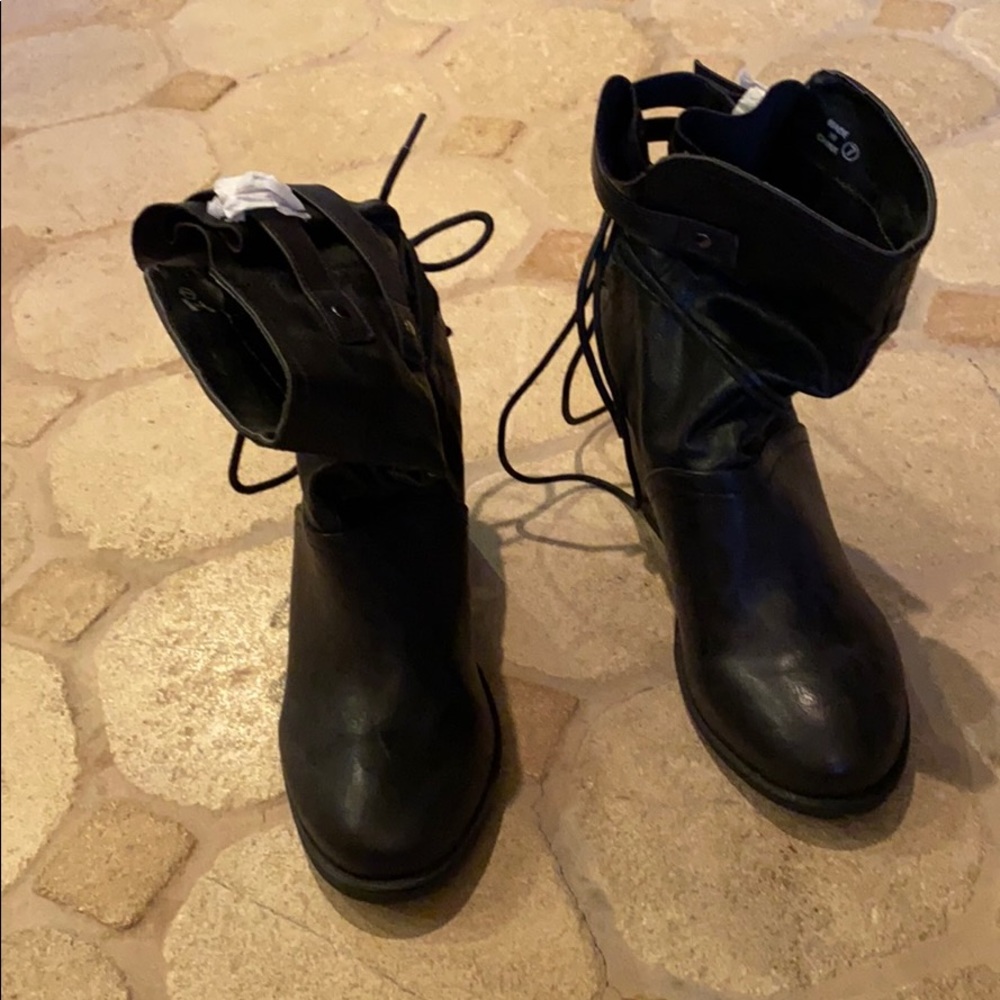 Brand new  boots. Still has wrapping on buckles